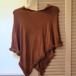 Poncho with faux fur trim
